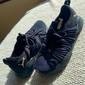 Puma black slip on sneakers